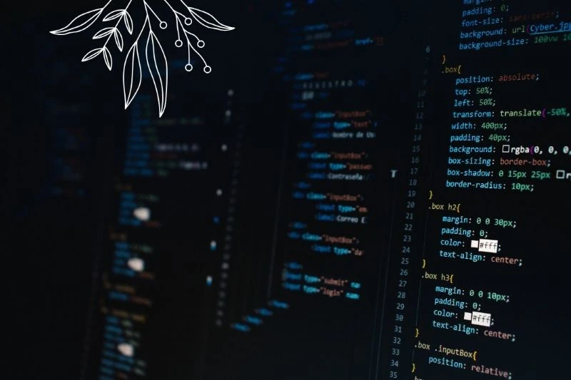 Códigos CSS numa tela de computador em fundo escuro.